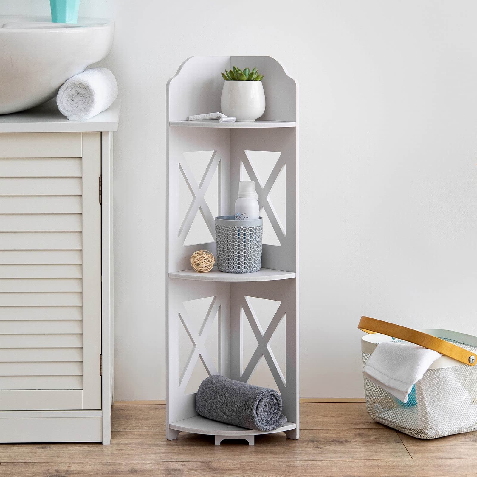 Tuoxinem corner shelf beside toilet holding toilet paper and toiletries for quick access