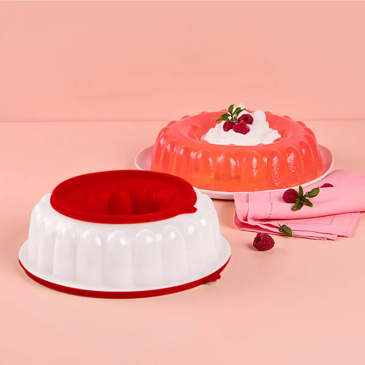 Tupperware Jel Ring held in hand to show compact 1.3 L capacity