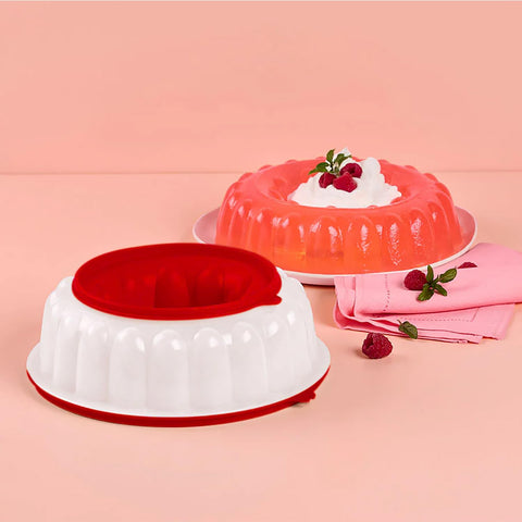 Tupperware Jel Ring held in hand to show compact 1.3 L capacity