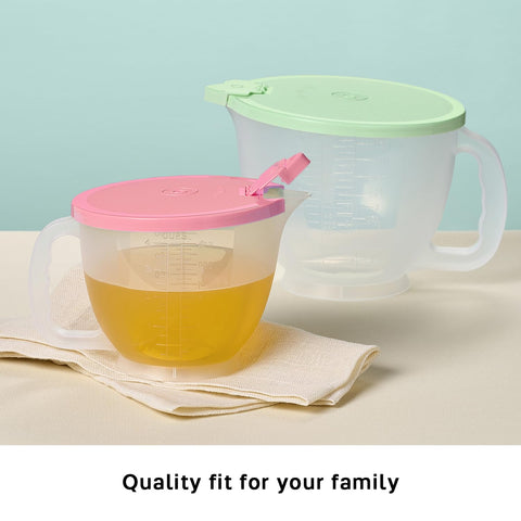 Tupperware lid and flip spout detail, spill-reducing pour control shown