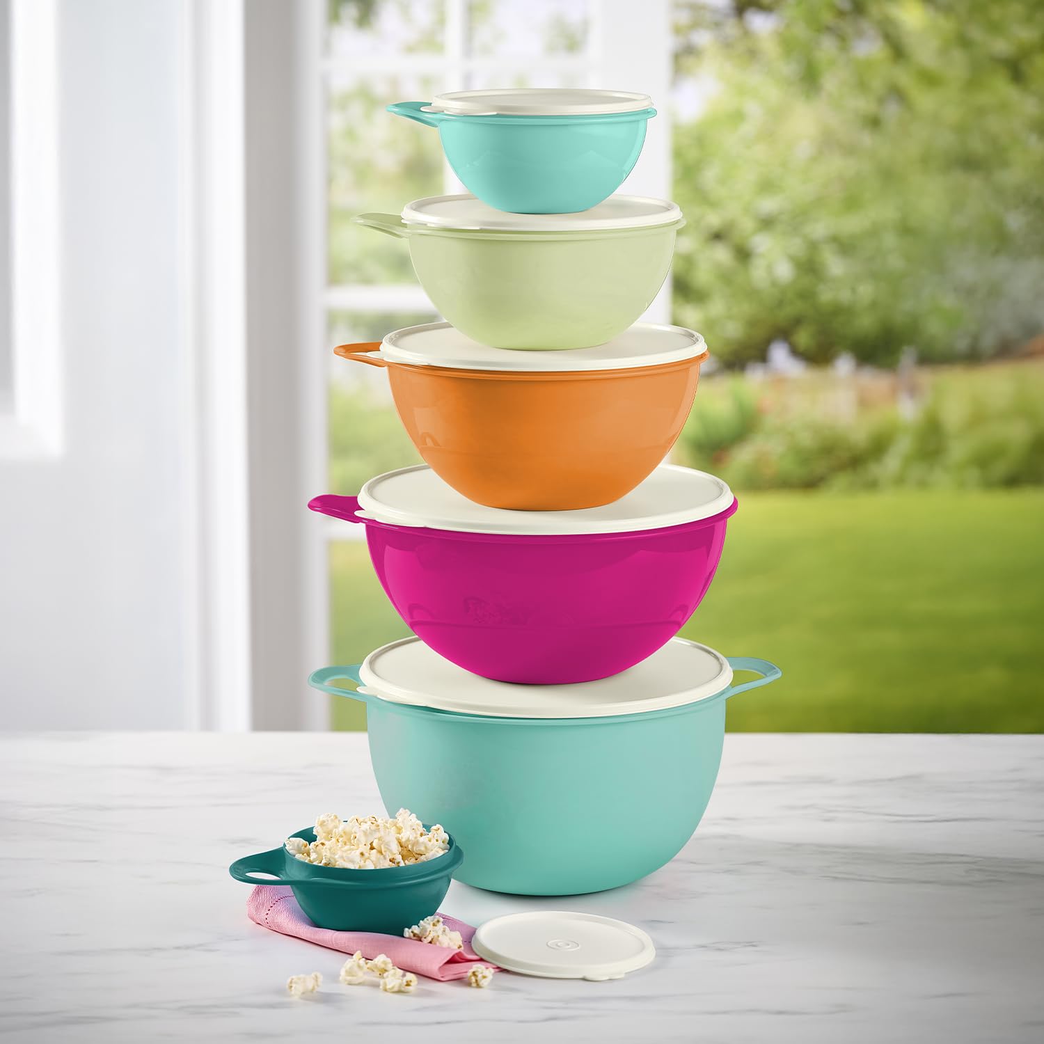 Tupperware Thatsa displayed on a table serving snacks, stylish practical serving
