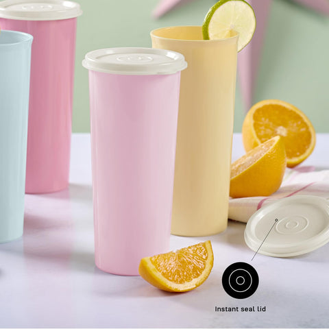Tupperware child holding tumbler showing comfortable grip and safe lightweight use