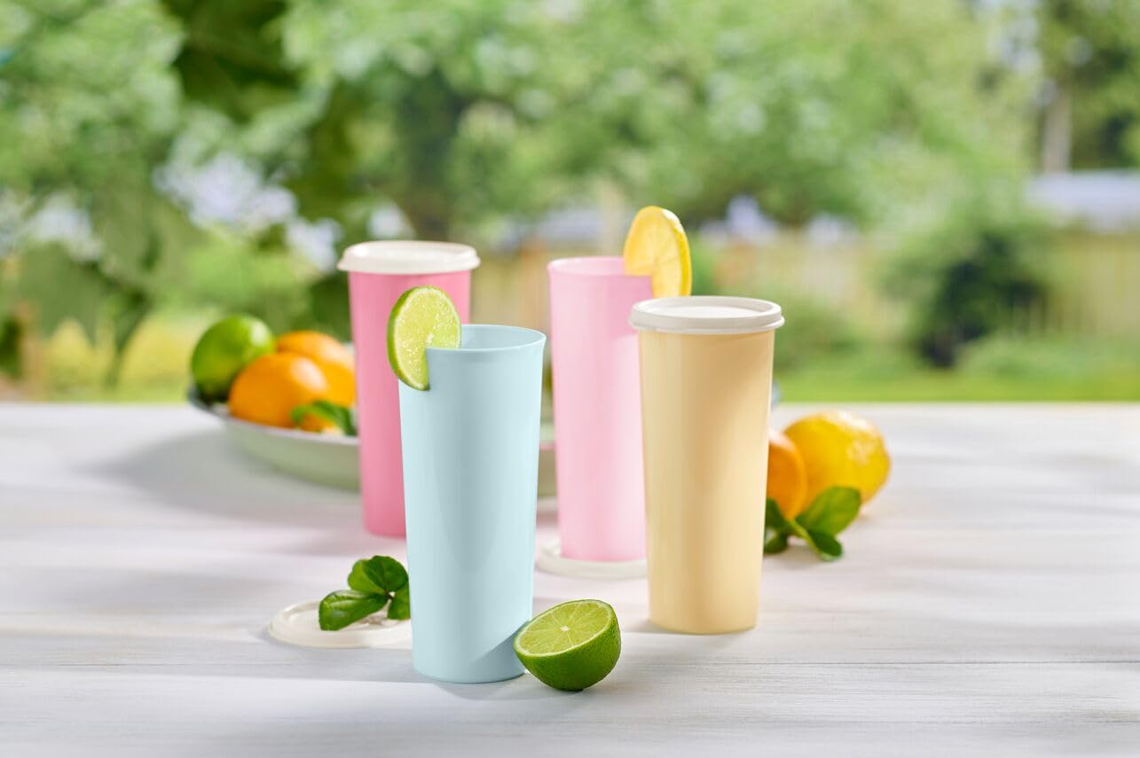 Tupperware tumbler next to hand to show 16 fl oz scale and easy handling