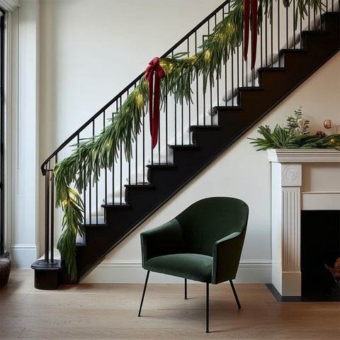 TW SHINE garland wrapped on a stair rail providing safe, decorative illumination