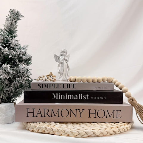 TwoDays books styled on a shelf to create a modern curated vignette
