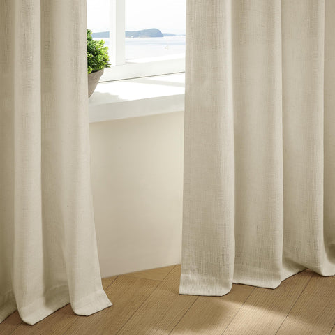 TWODRAPES care label and stitching closeup, highlights easy-care instructions and memory-shape trained pleats benefit