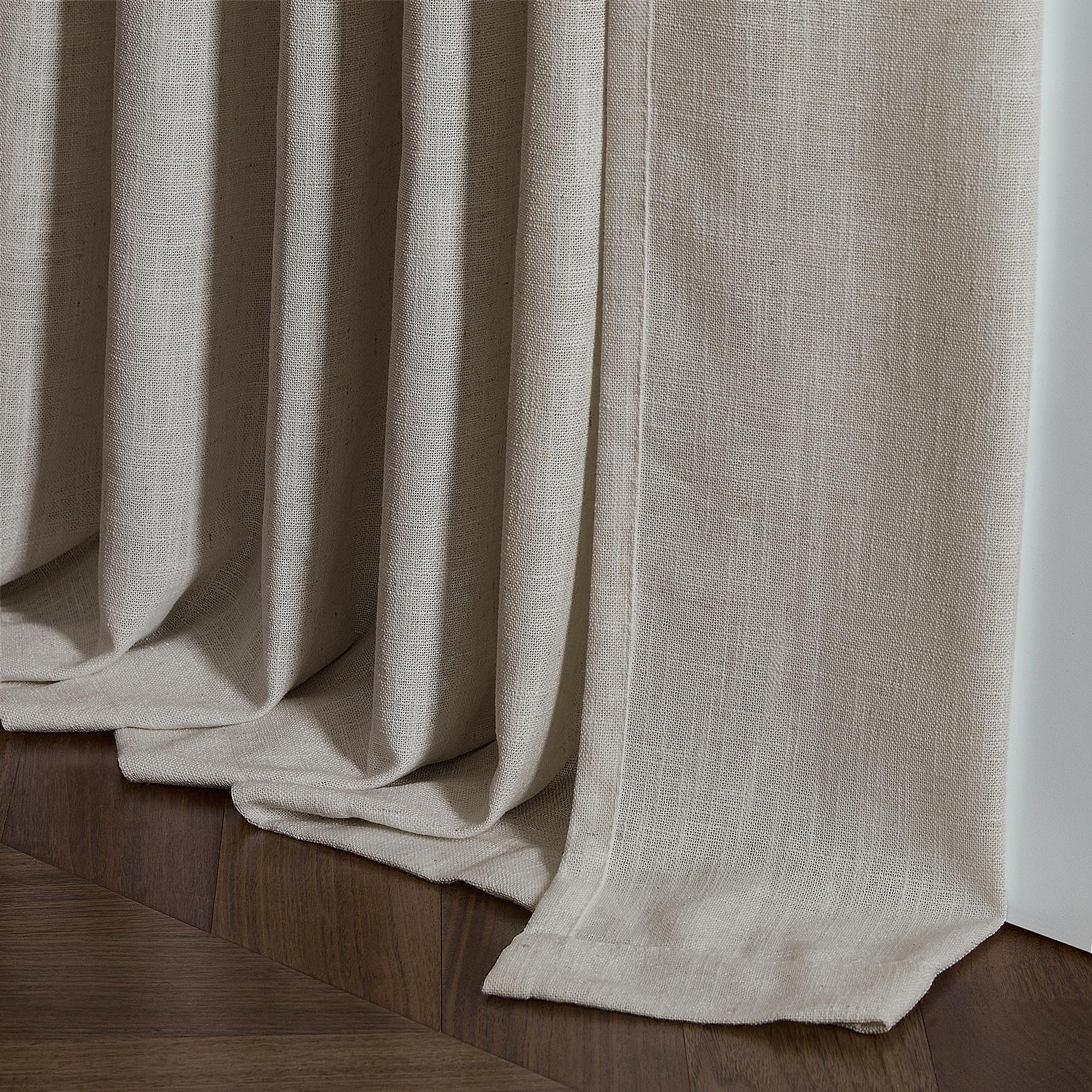 TWODRAPES panel filtering sunlight to create warm, soft interior lighting
