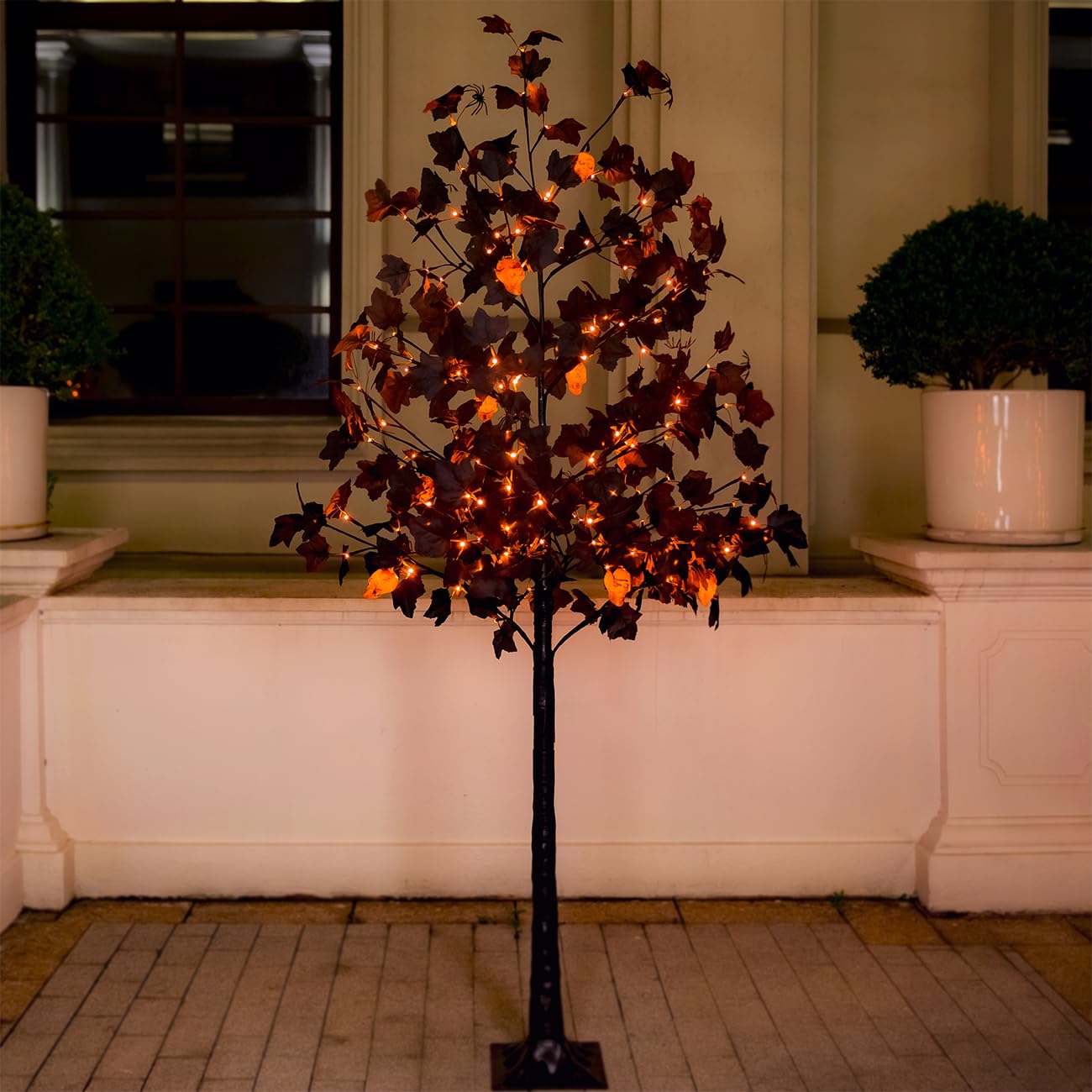 TYBEEU nighttime display lit up showing dramatic Halloween ambiance