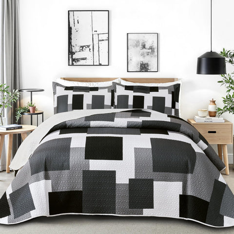 Tyrot front view of quilt set showing modern patchwork and instant style