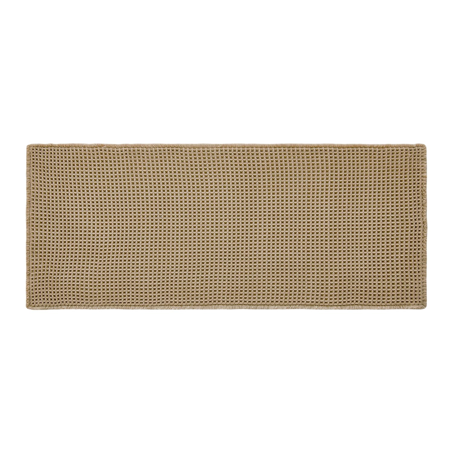 TYUU fabric label close-up showing material care and durable weave