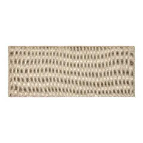 TYUU absorbency demo with water pooled on surface showing fast absorption benefit