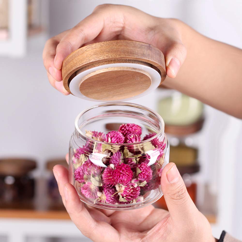 Tzerotone jars filled with colorful spices for quick ingredient identification
