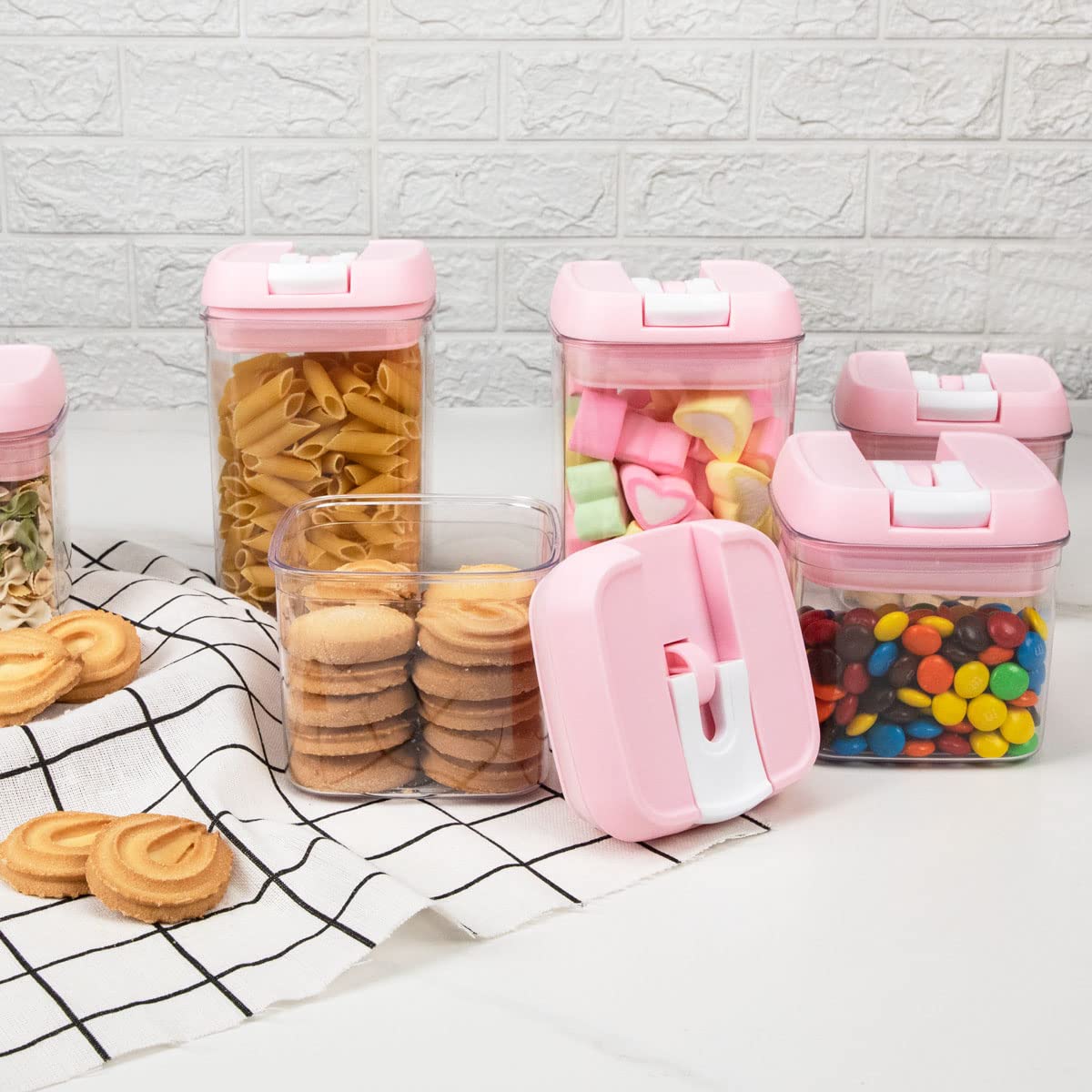 U-QE pouring cereal into a larger canister illustrating convenience and visible portions