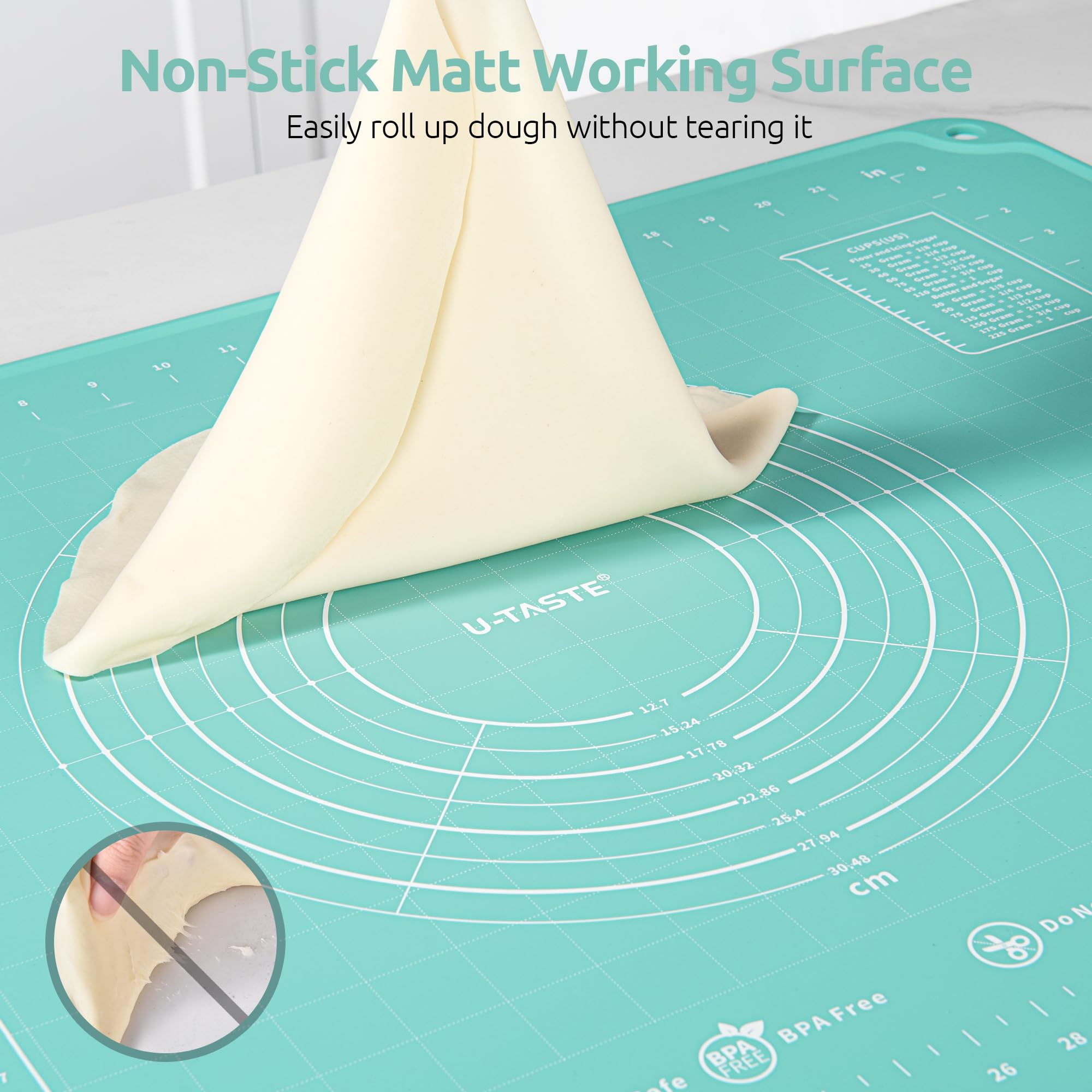 U-Taste mat next to a kitchen scale and ruler to show the 28x20 inch dimensions