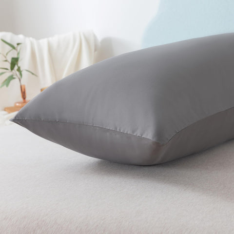 Ubauba size comparison on bed showing 20x54 inch scale and full-body coverage