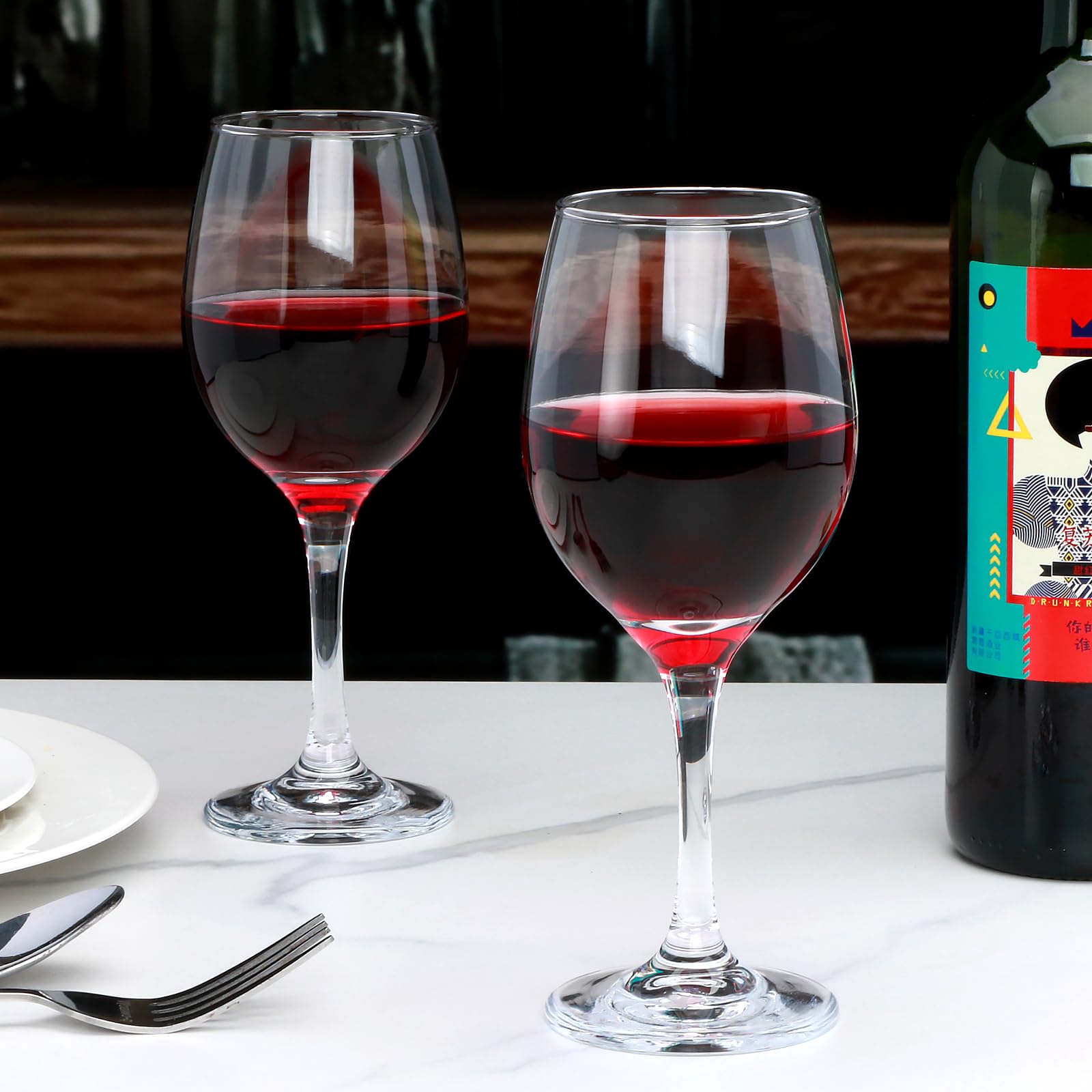 Two Ufrount glasses filled with red wine showcasing color clarity and aeration benefit
