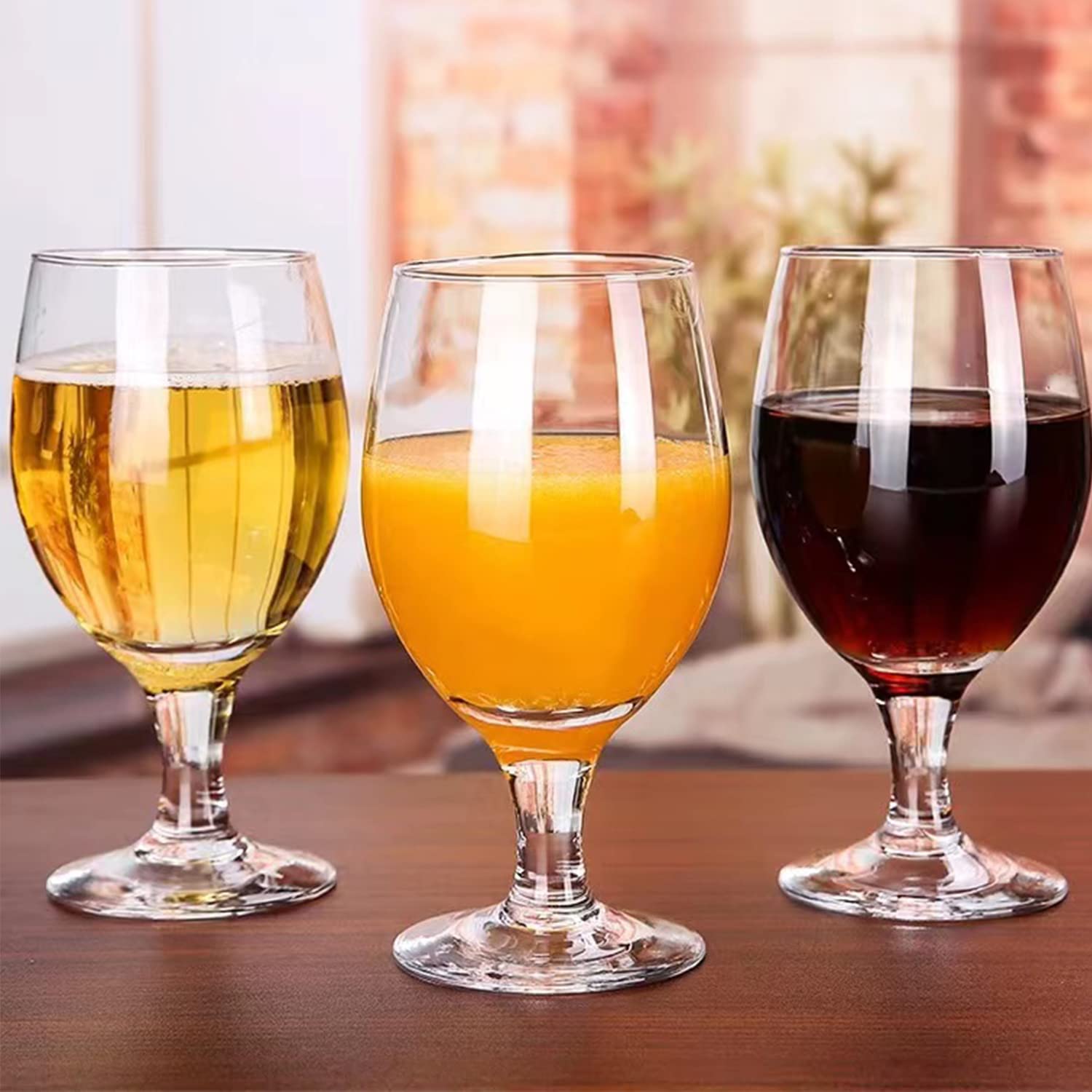 Ufrount glass with wine being poured illustrating practical use and enjoyment benefit