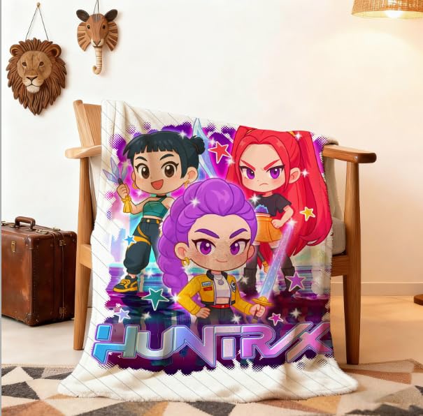 Ugecl blanket folded next to ruler showing 55 by 40 inch size clarity