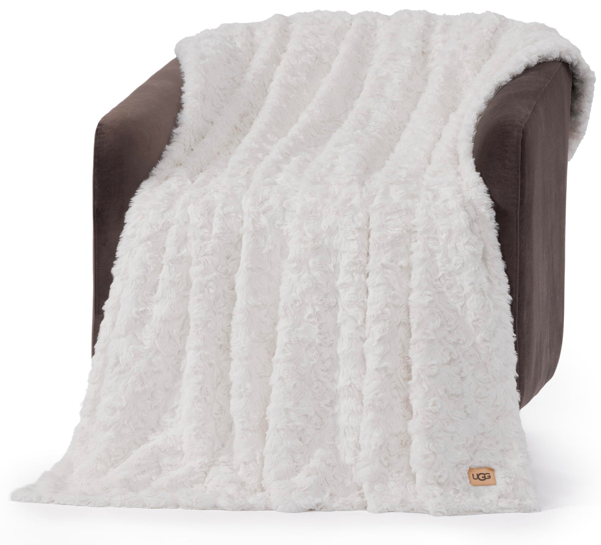 UGG Adalee front folded on couch showing clean white look and cozy appeal