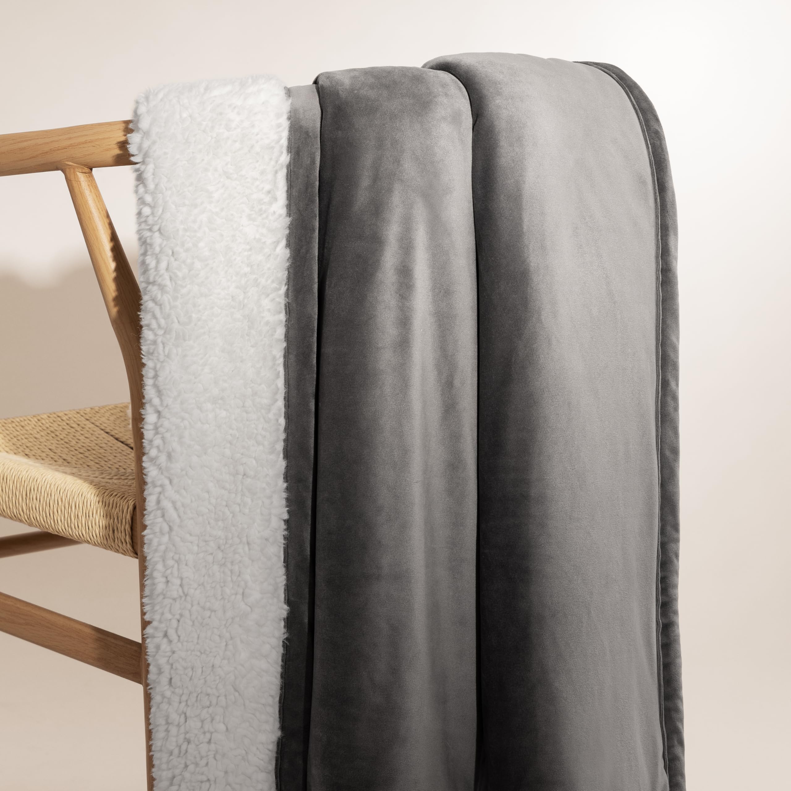 UGG throw on chair comparing 50x70 size for scale and functional fit