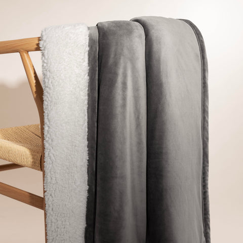 UGG throw on chair comparing 50x70 size for scale and functional fit
