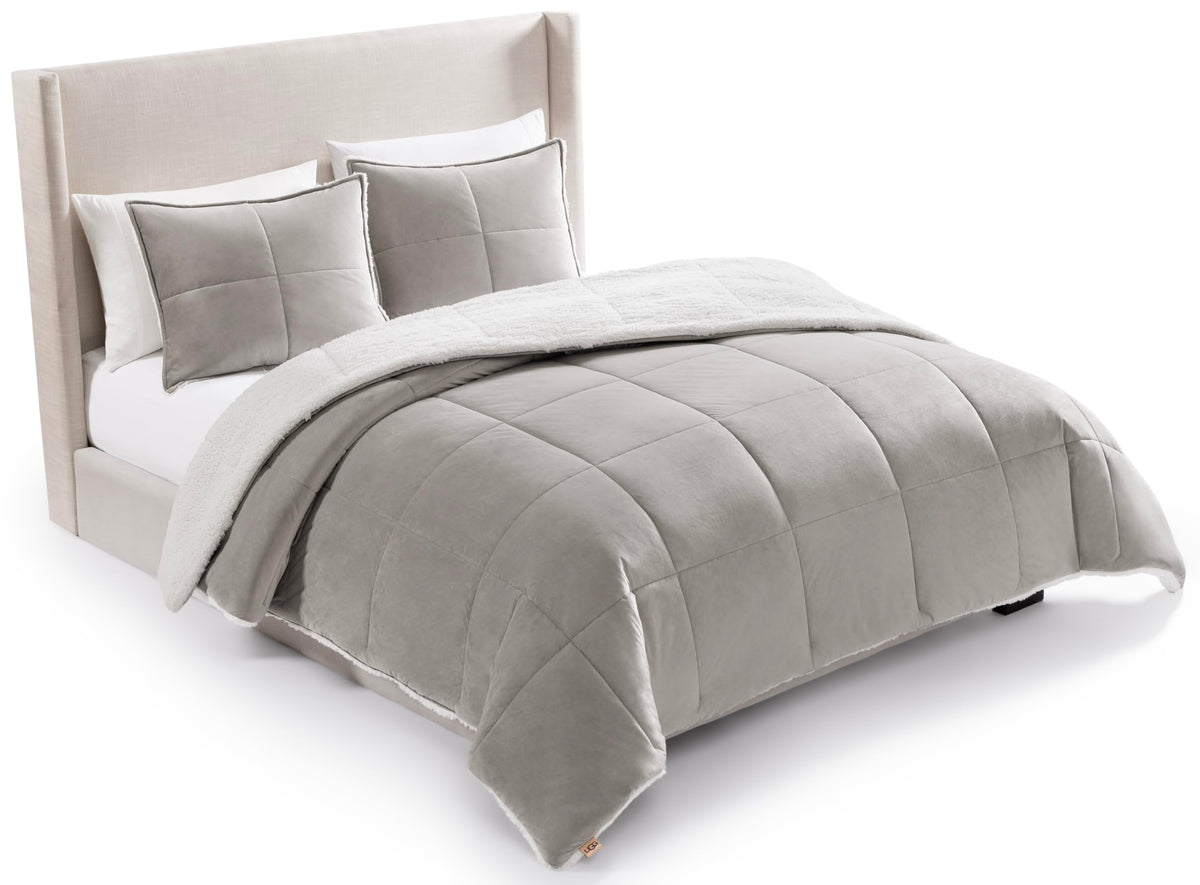 UGG comforter front view in seal grey showing tailored box-stitch and cozy benefit