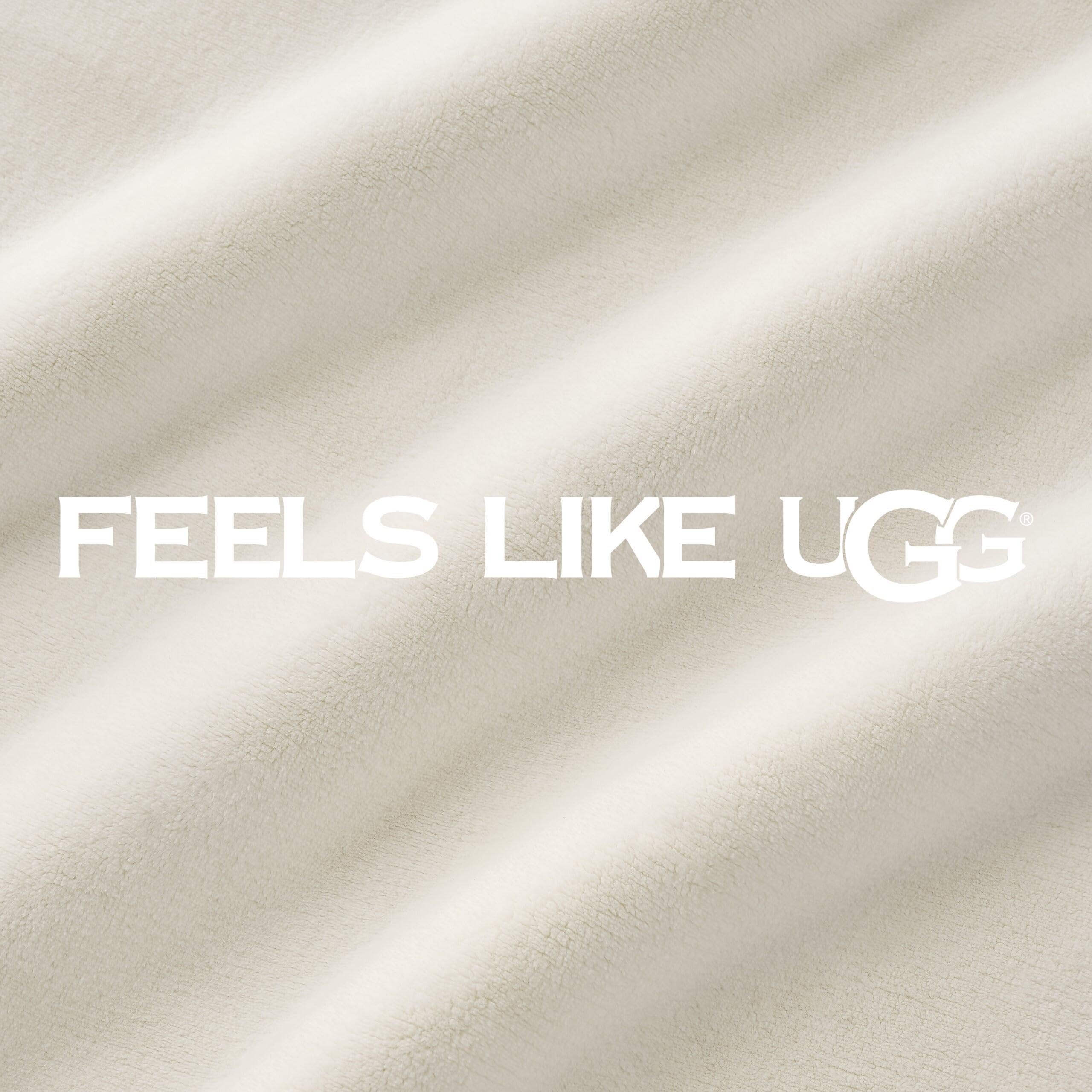 UGG Coco throw placed at foot of bed providing layered warmth benefit