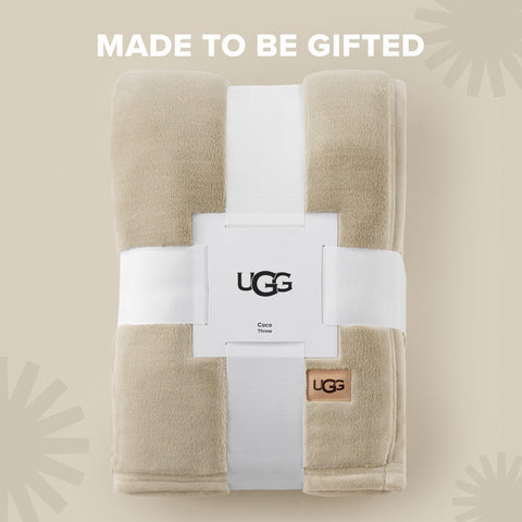 UGG Coco throw layered at foot of bed for decorative comfort