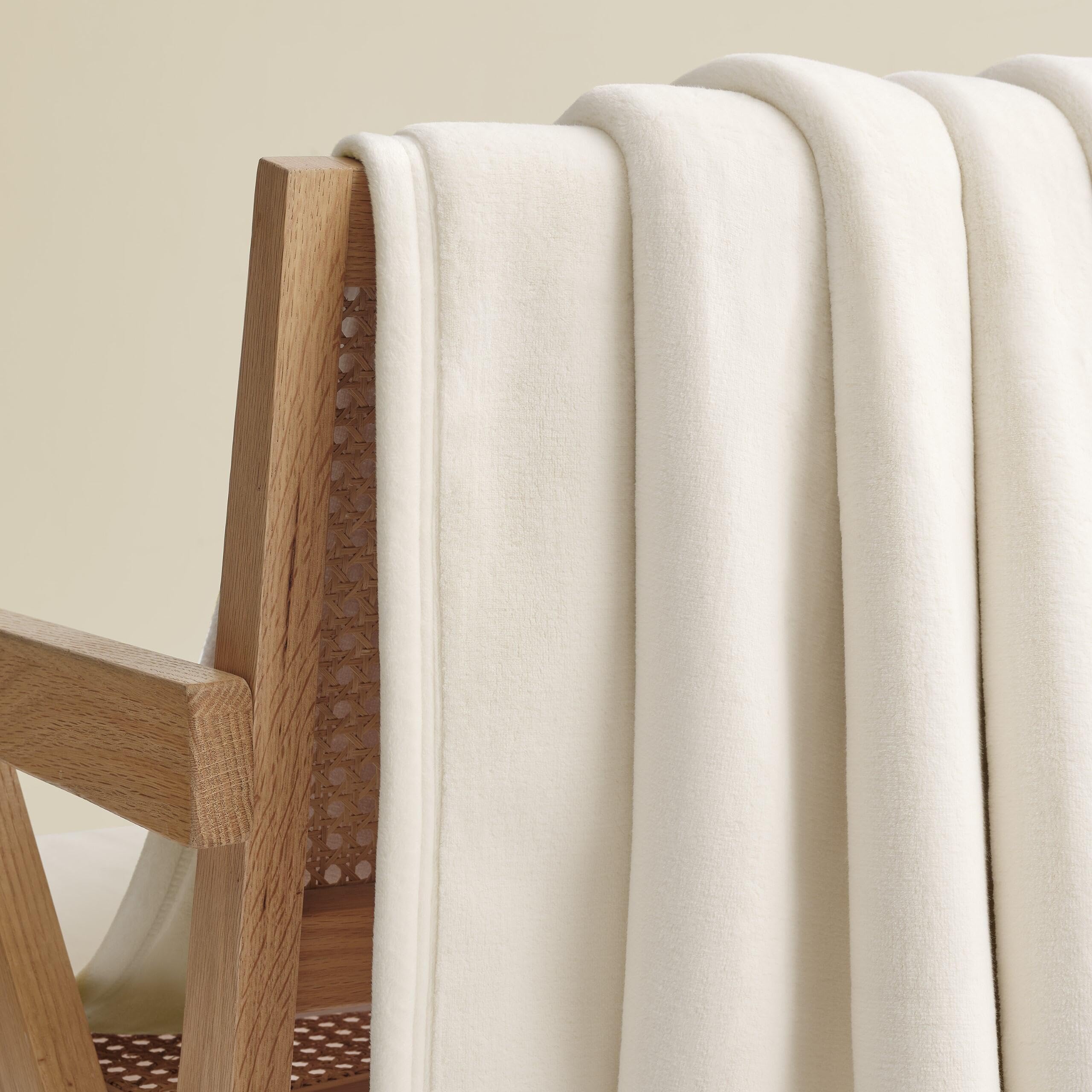 UGG Coco throw folded to show plush thickness and easy storage benefit