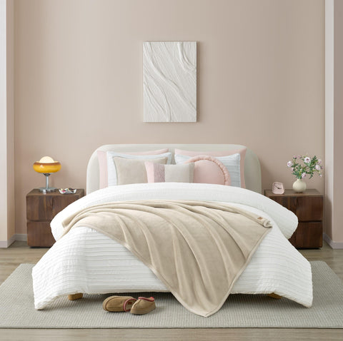 UGG Coco hand pressing pile to show plushness and comfort