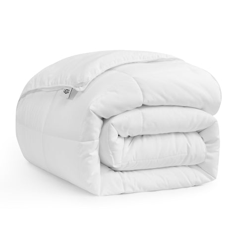 UGG Danielle front view on bed showing clean white comforter and neat finish