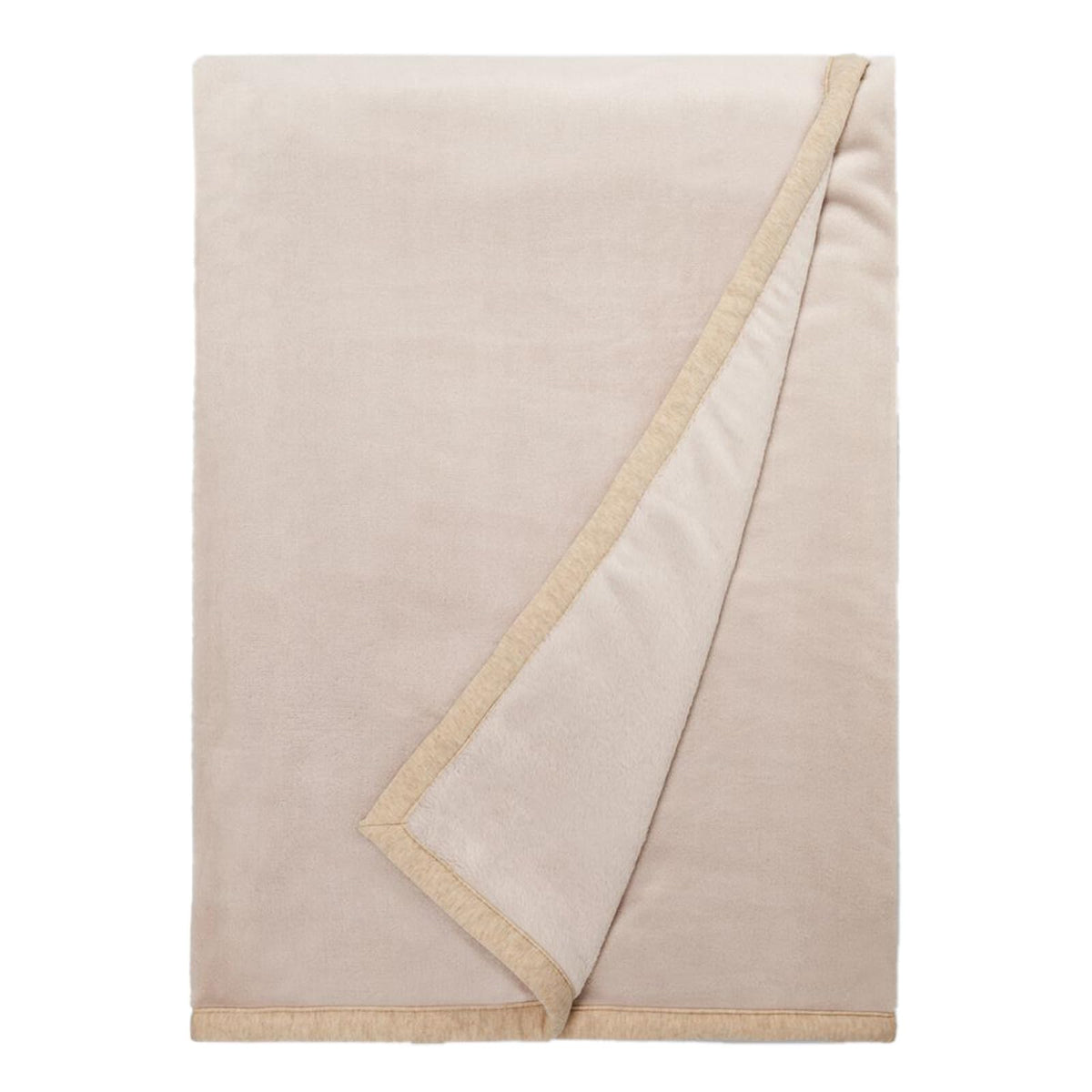 UGG Duffield Throw front folded on sofa for neat, cozy styling