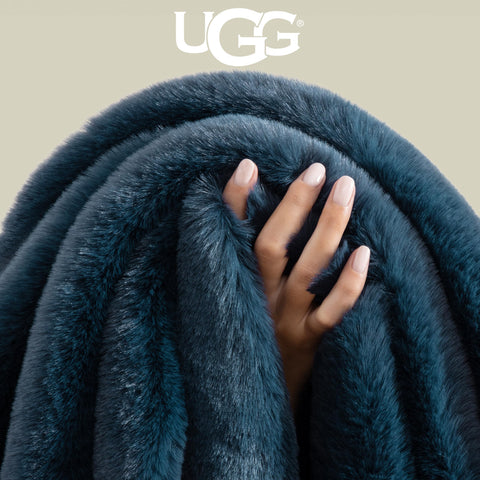 UGG Euphoria draped over sofa providing stylish warmth and decor impact