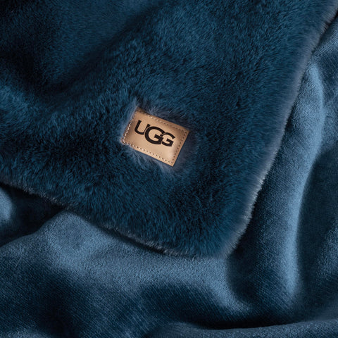 UGG Euphoria in use during reading illustrating comfortable lounging benefit