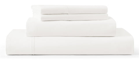 UGG Hedi front packaging showing white sheet set and luxury branding benefit: premium presentation