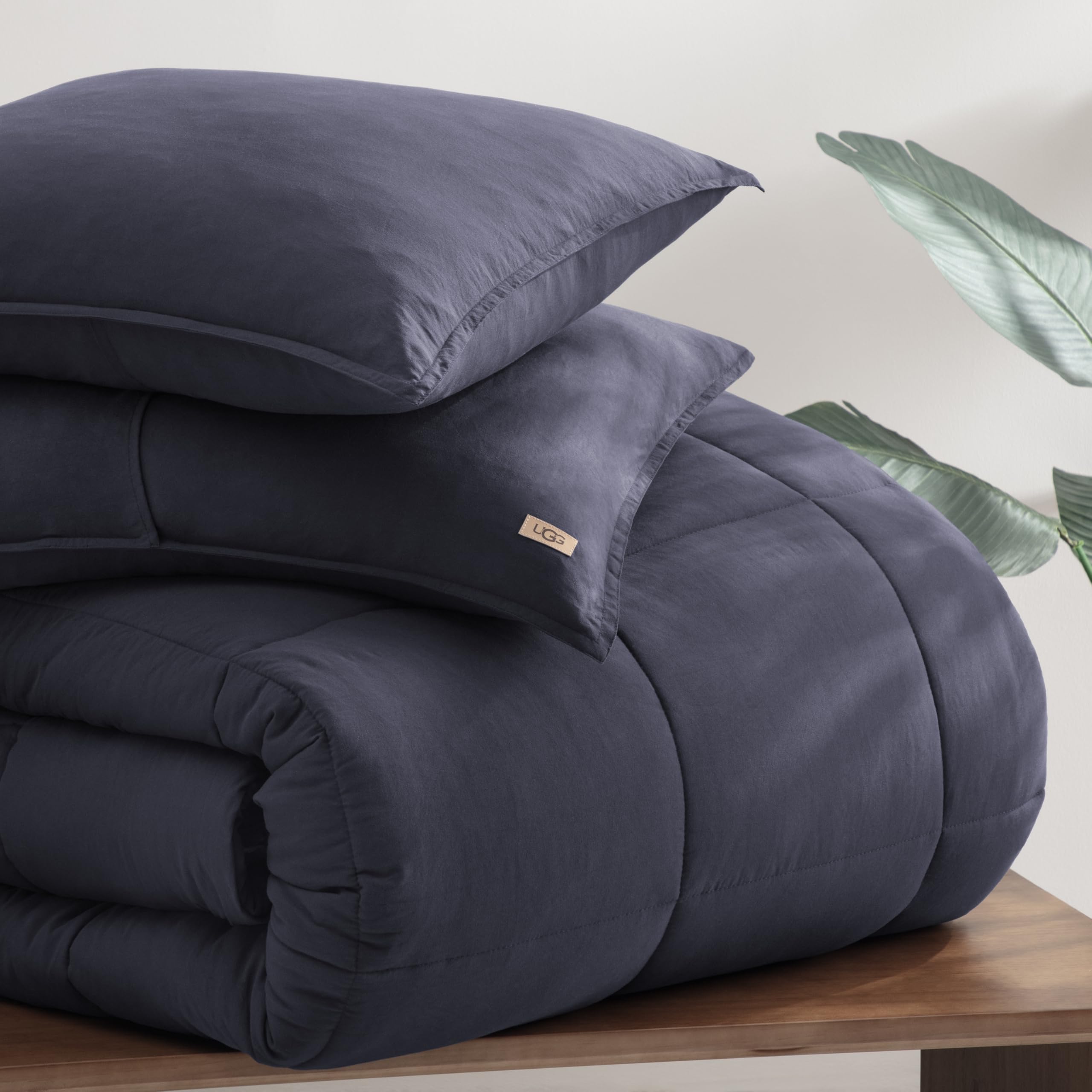 UGG Leonora folded comforter showing compact storage and travel readiness