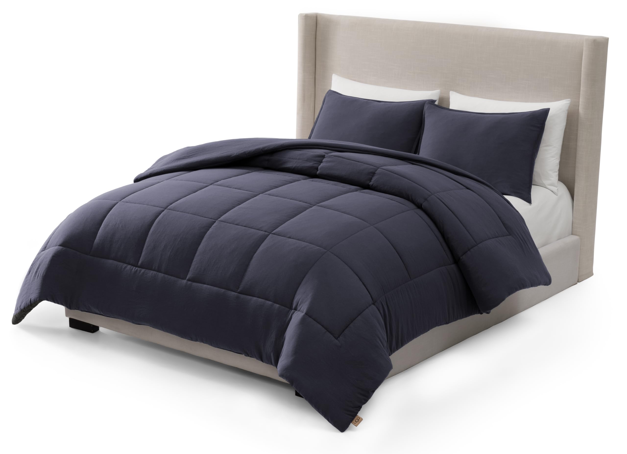 UGG Leonora comforter set front view on full bed showing navy color and neat fit