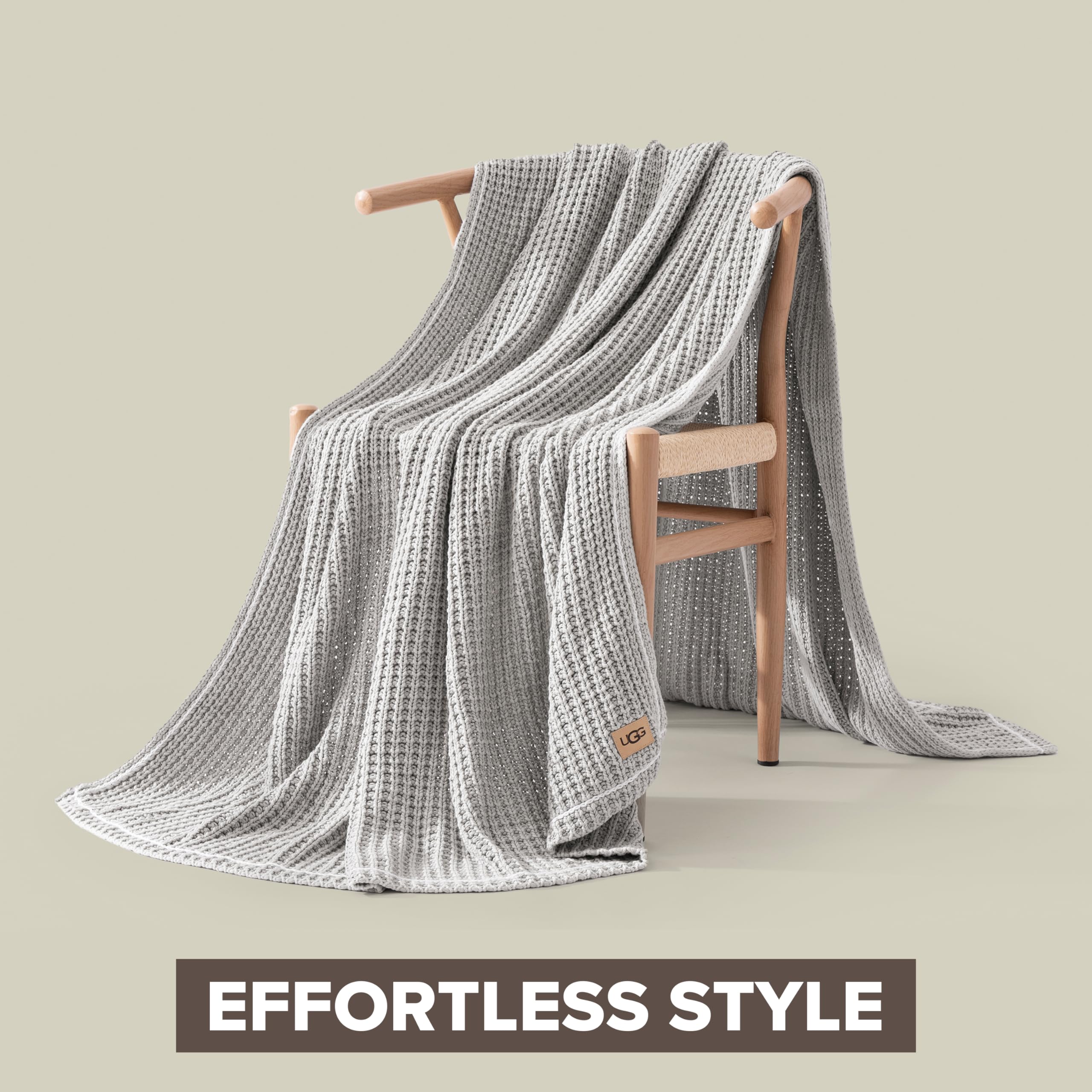UGG Luna draped over couch illustrating the blanket's cozy styling and everyday use