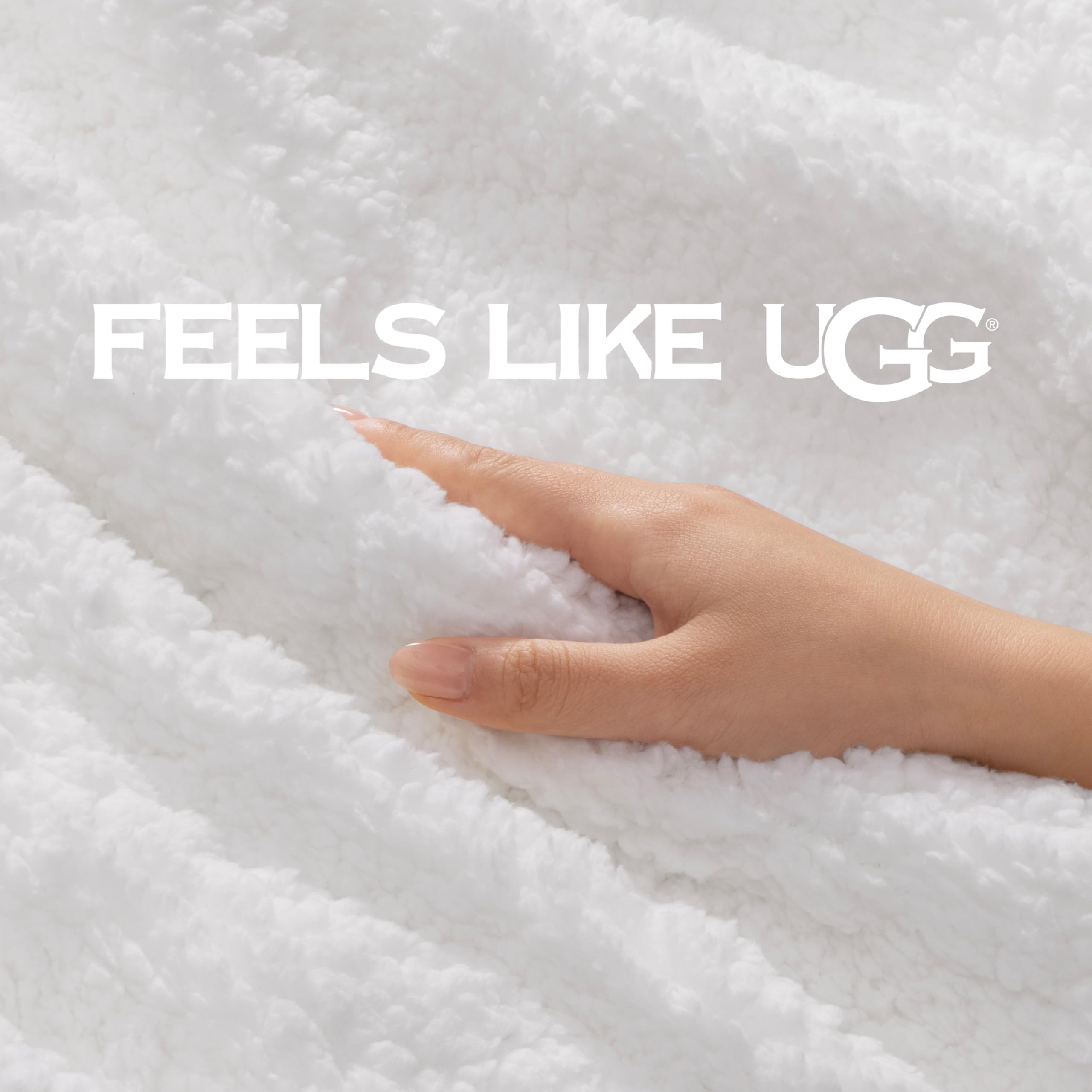 UGG Nita draped over sofa lifestyle showing living room warmth and decor