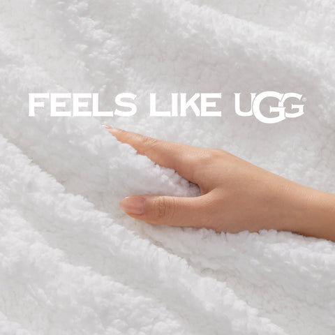 UGG Nita draped over sofa lifestyle showing living room warmth and decor