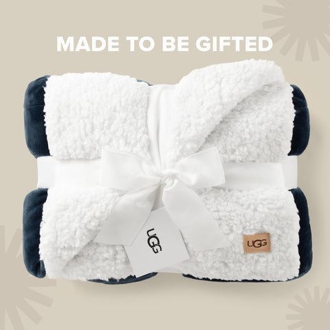 UGG Nita folded on couch showing color and layering benefit: instant living room update