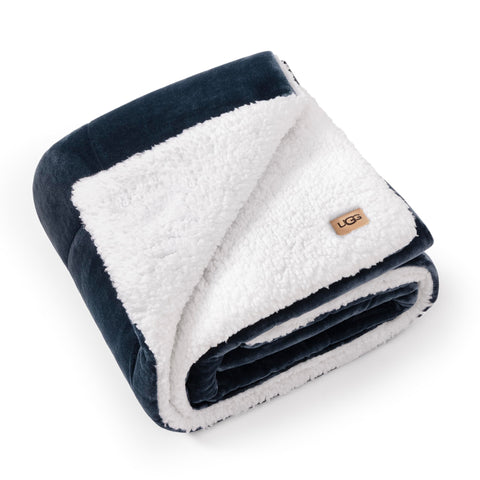 UGG Nita front view navy throw showing tailored box stitch and neat finish benefit: structured style
