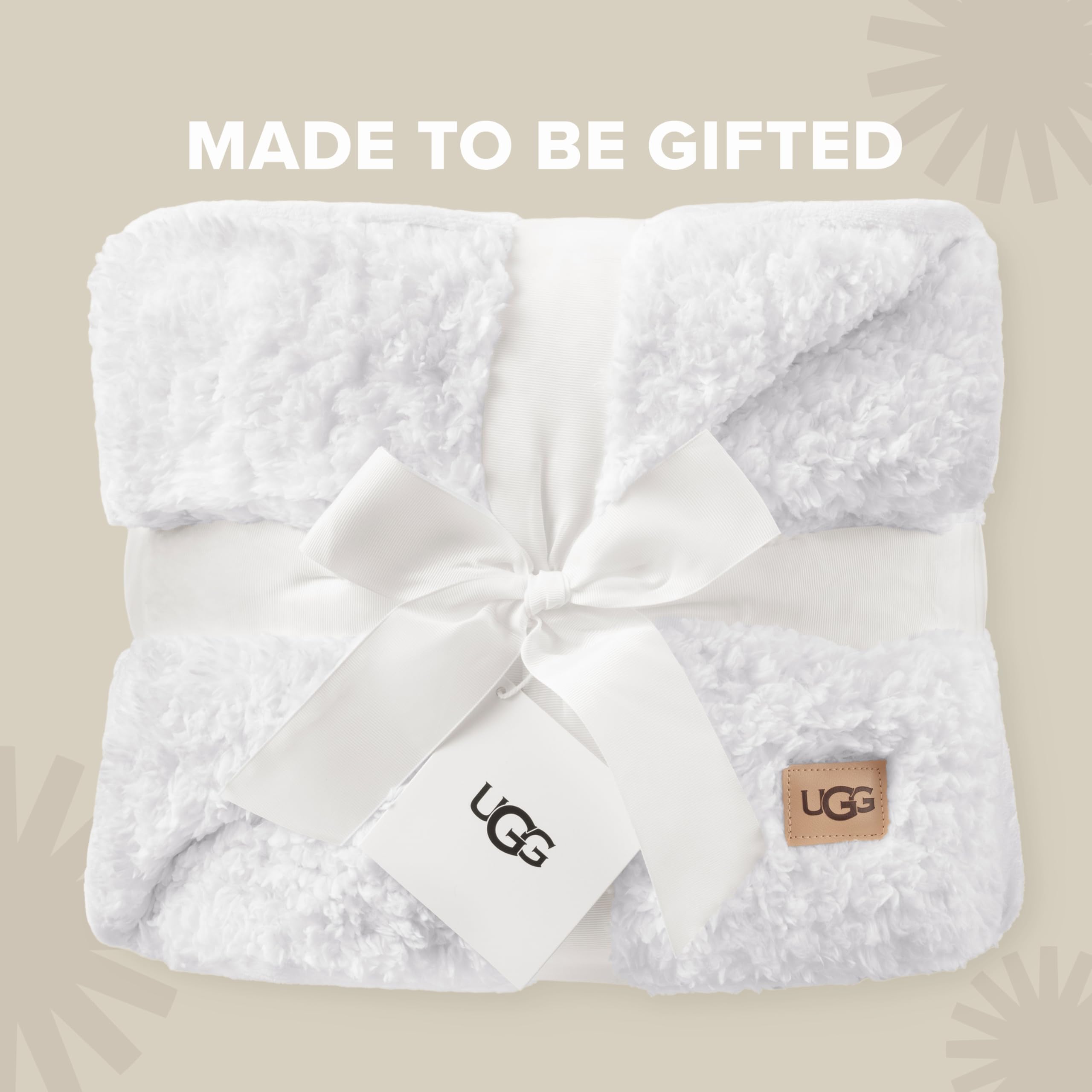 UGG Nita styled on a sofa adding warmth and modern decor