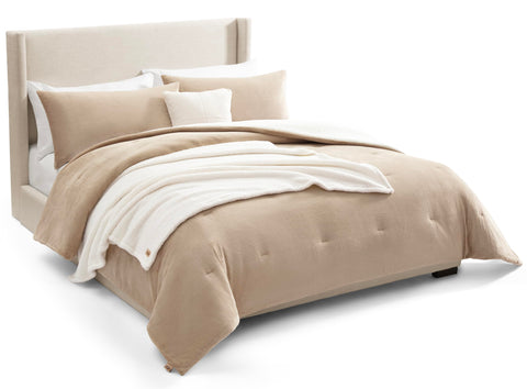 UGG Remina comforter front view showing plush beige face and neat edges for cozy styling