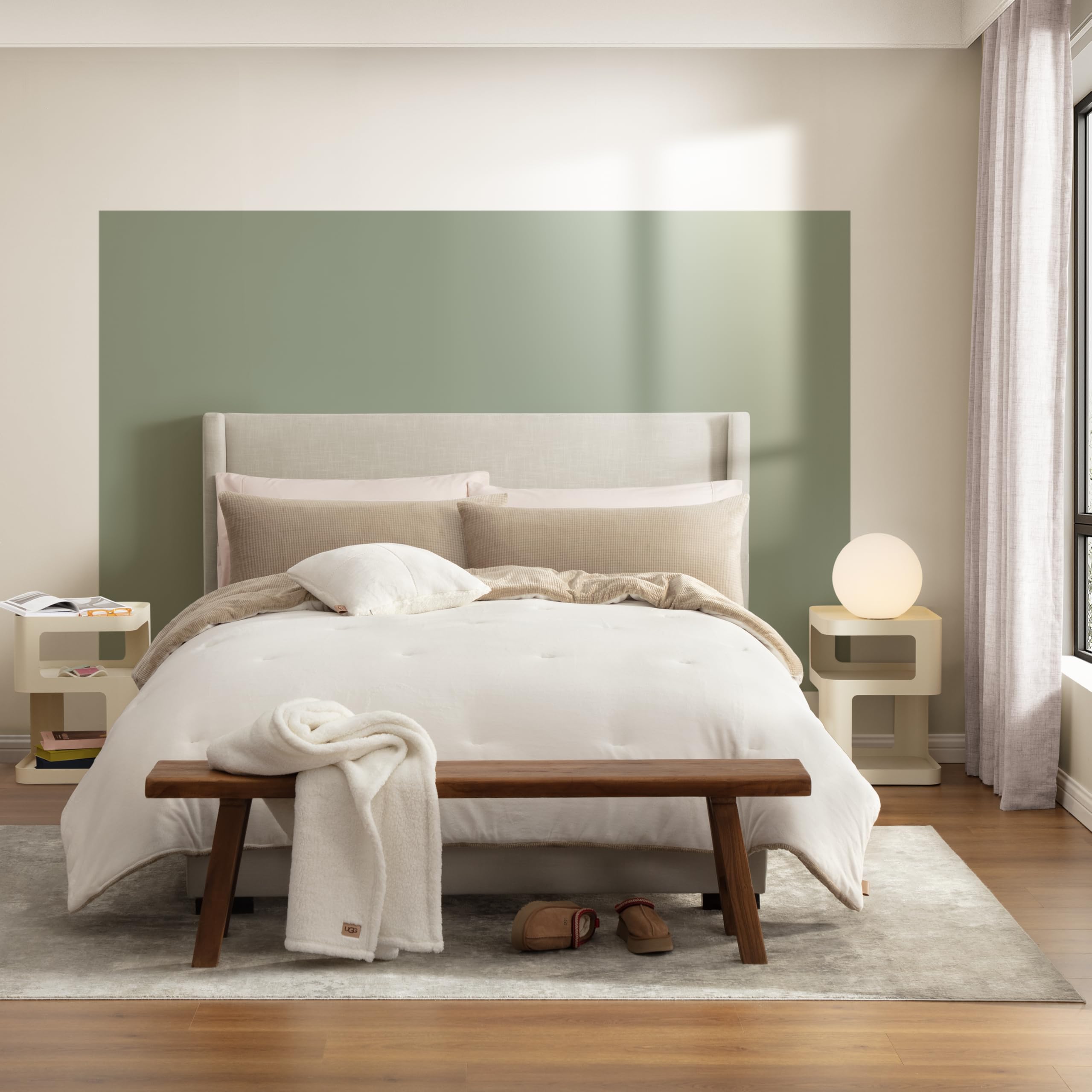 UGG Remina throw and decorative pillow arranged on bed adding layered texture and warmth