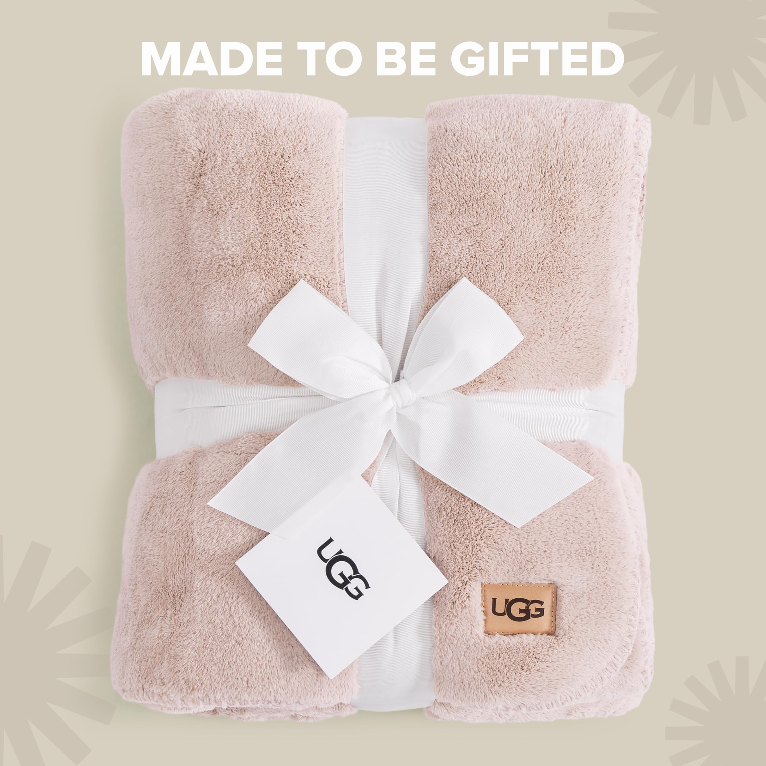 UGG whitecap folded on bed offering stylish layered bedroom look