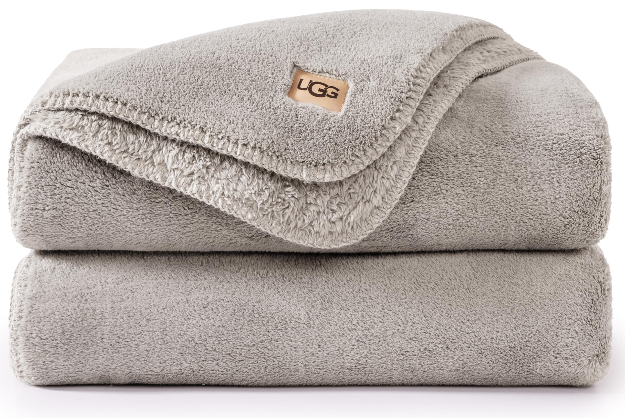 UGG Whitecap front view on couch showing soft neutral style and cozy appeal