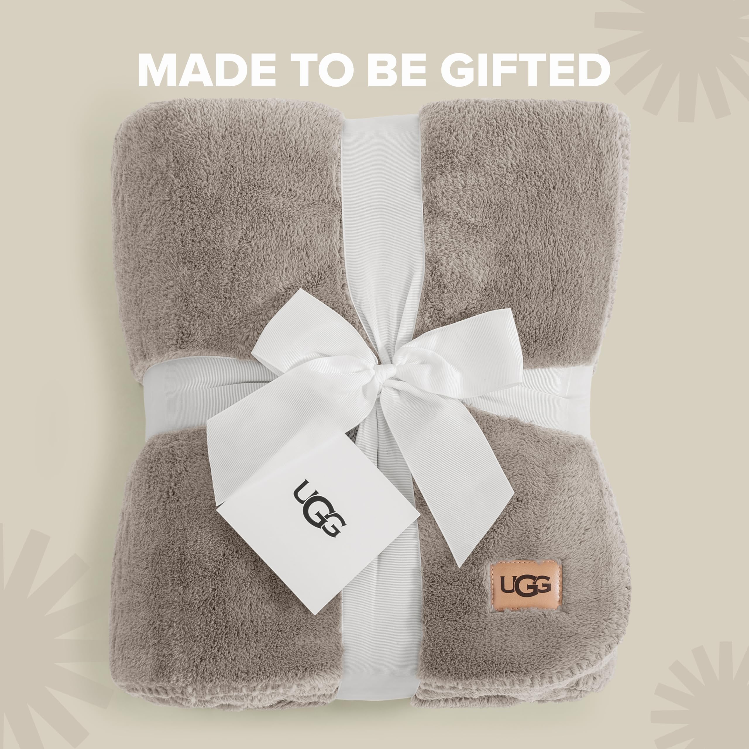 UGG Whitecap draped on sofa in living room giving stylish layered comfort