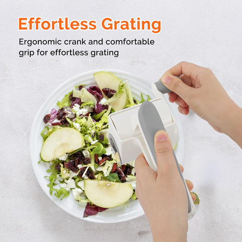 UHIYEE grater in use shredding Parmesan directly onto pasta for fast topping