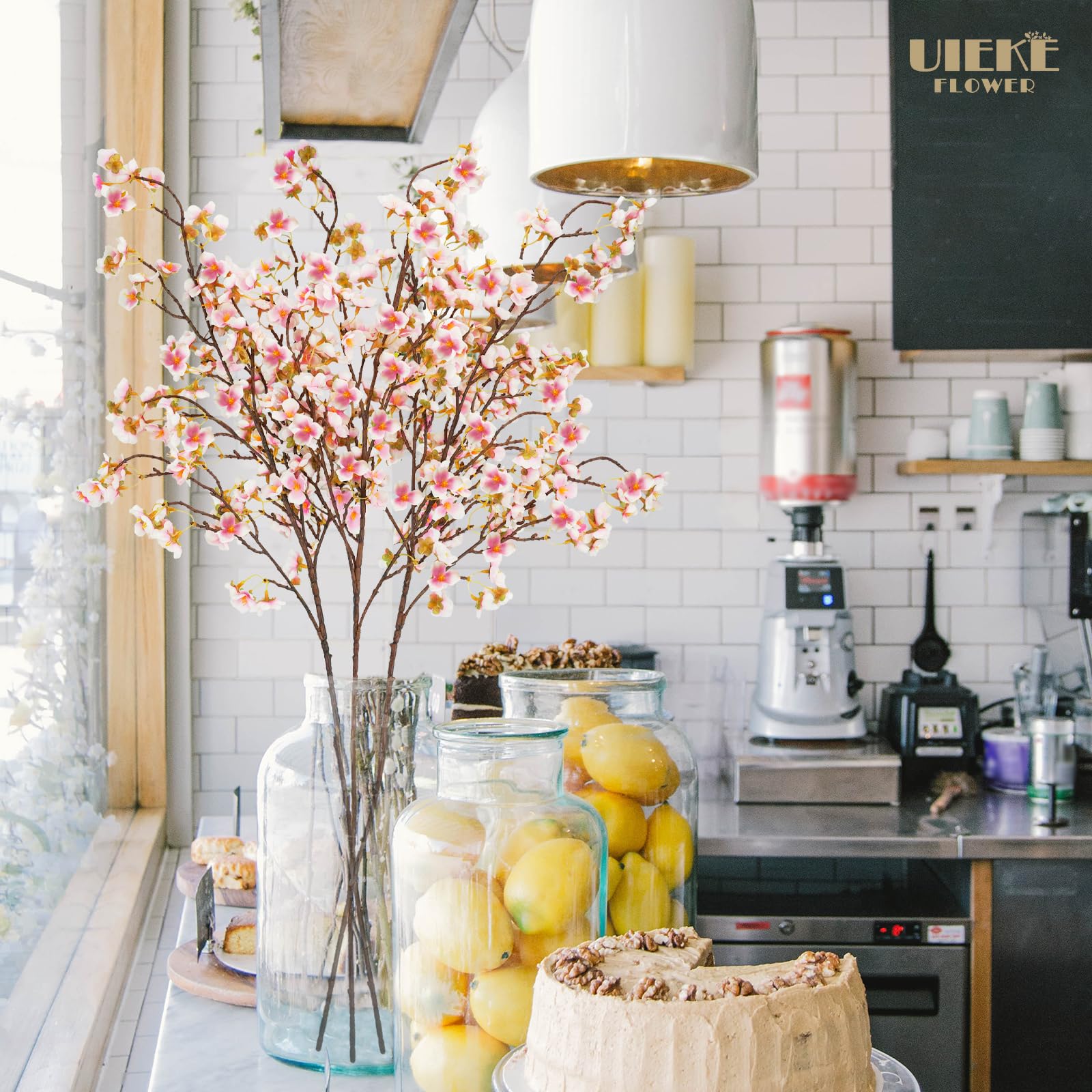 Uieke multiple branches in hallway vase creating long-lasting display